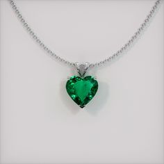 The pendant is entirely set in 18K white gold. The pendant features a beautiful, transparent 1.98 carat heart shape green emerald with the dimensions of 8.97 x 9.23 x 4.36 mm and a mixed brilliant cut. It has a clarity grade of slightly included (evaluated at eye level), vivid color saturation, and an excellent polish. The origin of this emerald is Zambia. #gift necklace #beautiful necklaces #necklace for her #accessories necklaces #necklace cute Luxury Teardrop Pendant Emerald Necklace, Luxury Emerald Necklace With Vvs Clarity As A Gift, Emerald Pendant Necklace Zales, Luxury Emerald Teardrop Pendant Necklace As Gift, Luxury Emerald Teardrop Pendant Necklace, Luxury Vvs Clarity Emerald Necklace As Gift, Luxury Teardrop Emerald Pendant Necklace, Luxury Formal Emerald Pendant Necklace, Heart Green Necklace