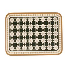 a black and white rug with an intricate design on the bottom, in front of a white background