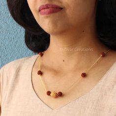 Add a religious touch to your look with this handmade Rudraksha Necklace. The minimalist design features 6mm Rudraksha beads held individually by a gold-plated chain, keeping it simple and cute. The necklace comes with a short chain, making it versatile enough to be worn with casual or ethnic outfits for any occasion. Additionally, it's open for customization--feel free to message me with any specific requests. The chain is elegantly gold-plated, adding a touch of sophistication to the piece. Em Spiritual Jewelry With Beaded Chain For Festivals, Spiritual Beaded Chain Jewelry For Festivals, Spiritual Tiny Beads Jewelry For Festivals, Gold Rudraksha, Rudraksha Necklace, Rudraksha Jewelry, Mangalsutra Chain, Rudraksha Beads, Chain Making