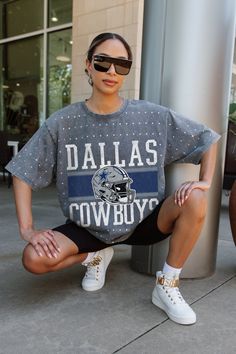 Make a statement in any crowd with our Dallas Cowboys oversized fit, all-over mini rhinestone short sleeve tee featuring a ribbed neckline. Embrace the sparkle while staying comfortable—perfect for every dedicated fan. Dallas Cowboys Maternity Shirt, Dallas Cowboys Outfits, Diy Cut Shirts, Soccer Outfits, Cowboys Shirt, New Orleans Saints, Ribbed Neckline, Kansas City Chiefs, Cut Shirts