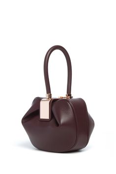 Nina Midas Bag in Bordeaux Nappa Leather Gabriela Hearst Nina Bag, Designer Top Handle Clutch With Detachable Handle, Designer Clutch With Detachable Top Handle, Versatile Formal Tote Box Bag, Versatile Tote Box Bag For Formal Occasions, Elegant Bucket Bag With Detachable Strap And Top Handle, Elegant Bucket Bag With Detachable Strap, Elegant Top Handle Bucket Bag, Formal Bucket Bag With Removable Pouch And Top Handle