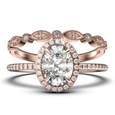 a rose gold engagement ring set with an oval cut diamond surrounded by two rows of diamonds