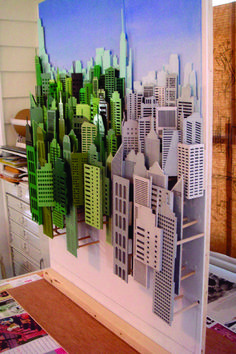 the city is made out of paper and cut into smaller sized buildings, including skyscrapers