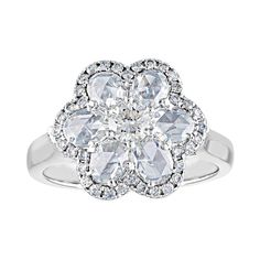 Flower Ring. The Ring is 18K White Gold. There are 1.13 Carats Rose Cut Diamonds F VS. There are 0.52 Carats Small Round Diamonds F VS. The ring measures about 0.50" wide. The ring is a size 7.0, sizable. The ring weighs 7.1 grams.