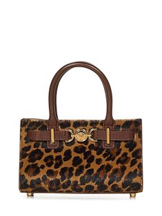 Medusa-Plaque Leopard Printed Tote Bag from VersaceMagnetic Closure Brown Leather Double Top Handle; Adjustable And Detachable Brown Leather Shoulder Strap Brown Leather Belt Detail With Metal Medusa '95 Hardware At Front Interior: One Main Compartment, One Flat Pocket Metal Feet Gold-toned Metal Hardware All-over Wild Leopard Pattern; Brown Calf Leather Details Animalier Color , 100% Calf Hair; Lining:, 100% Lambskin; Finishes:, 100% Calf Leather Made In Italy Luxury Leopard Print Bag With Leather Handles, Leopard Print Handbags, Luxury Leopard Print Rectangular Bag, Leopard Print Tote, Elegant Bag With Leopard Print And Gold-tone Hardware, Wild Leopard, Valentino Garavani Bag, Rectangular Leopard Print Shoulder Bag With Gold-tone Hardware, Leopard Print Tote Shoulder Bag With Gold-tone Hardware