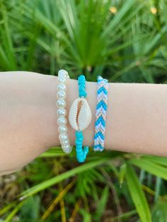 This beachy coastal set comes with 3 bracelets. You can buy them separately or together as a set! Each bracelet is around 6 inches, please message me if you need a smaller or larger size. Trendy Strand Friendship Bracelets For Beach Season, Trendy Colorful Beaded Friendship Bracelets For Beach Season, Trendy Beaded Strand Friendship Bracelets, Casual Colorful Beads Friendship Bracelets For Beach Season, Trendy Friendship Bracelets For Beach Season, Trendy Beaded Braided Bracelets For Beach, Trendy Beaded Braided Bracelets For Vacation, Casual Beach Wrap Bracelet With Colorful Beads, Casual Colorful Beads Friendship Bracelet For Beach Season