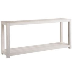 a white shelf sitting on top of a wooden floor