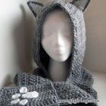 crocheted cat hood and scarf with paw prints on the front, side, and back