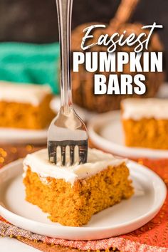 a slice of pumpkin bars on a white plate with a fork in it and text overlay