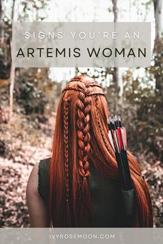 a woman with long red hair holding an arrow in her hand and the words, signs you're an artemus woman