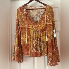 Beautiful Bell Sleeved Rip Curl Boho Blouse! Nwt!! Runs Oversized! Ptp 20” Long Sleeve Patterned Tops For Vacation, Fall Boho Print V-neck Tops, Boho Print Long Sleeve Beach Top, V-neck Peasant Top For Fall Vacation, Bohemian Patterned Tops For Fall, Bohemian Tops For Fall Vacation, Casual Boho Print Peasant Top For Fall, Fall Vacation Blouse With Boho Print, Long Sleeve Boho Print Top For Beach