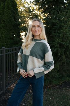 We're loving the oversized checkerboard design of this sweater. Made using our chunky sweater yarns, this cozy pullover features a relaxed fit, a wider sleeve opening, and hits at the waist. Relaxed fit Sweater Yarns: 68% Acrylic 31% Polyester 1% Spandex Color Blocked Full Length Sleeves Crew neck Hand wash cold, wash with like colors, do not bleach, lay flat to dry, warm iron if needed Palm Green, Cozy Pullover, Chunky Sweater, Fitted Sweater, Wide Sleeves, Lay Flat, Color Block, Length Sleeve, Full Length