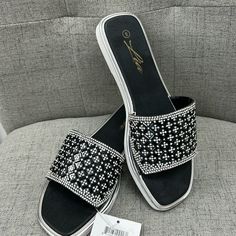 Nwt Black And Rhinestone Slide In Sandals. Black Bling Sandals For Summer, Summer Black Sandals With Bling, Glamorous Bedazzled Black Sandals, Glamorous Black Sandals With Bling, Black Bling Sandals For Night Out, Black Bling Sandals For The Beach, Beach Sandals With Bling In Black, Beach Bling Black Sandals, Black Embellished Sandals For Spring