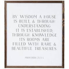 a wooden frame with the words by wysdom a house is built and through it's established through knowledge its rooms are filled with rare & beautiful treasures