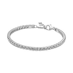 Tennis bracelets, anyone? This sterling silver Sparkling Tennis Bracelet features squared collets and is decorated with a bold line of clear cubic zirconia to make a statement fit for any occasion. Wear it on its own or stack bracelets of different colors and metal finishes for a modern look. Pandora Armband, Silver Jewlery, Stack Bracelets, Bracelet Tennis, Bracelet Cordon, Cubic Zirconia Bracelet, Jewelry Accessories Ideas, Bracelet Cuir, Jewelry Lookbook