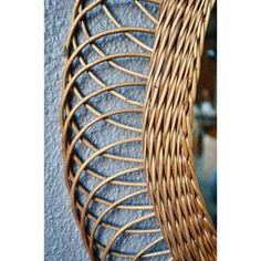 a wicker basket hanging on the wall