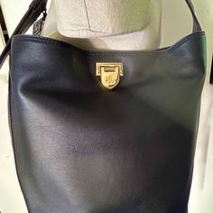 Ralph Lauren Leather Medium Harlow Hobo Bucket Bag Shoulder Handbag Adjustable Shoulder Strap With A 7" Maximum Drop. "Lrl"-Engraved Flip-Lock Closure Flips Upward To Release The Front Fold-Over Flap "Lauren Ralph Lauren" Imprint Logo At The Bottom Back (Into Leather) Interior Zip Pocket And Slip Pocket. 10.5" H X 14.5" L X 6.25" D. Weighs Approximately 1 Lb., 8 Oz. Polyester Lining And Recycled Polyester. Shell: Leather. Lining: Polyester Fast And Free Shipping Thank You For Making All Inquirie Ralph Lauren Bags, Ralph Lauren Leather, Handbag Black, Shoulder Handbag, Bag Shoulder, Black Handbags, Leather Interior, Shoulder Handbags, Lauren Ralph Lauren