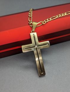 A custom design by our jewelers, made for those looking for something big, straightforward, and build to last! Our 14K gold cross is made to order with your choice of gold color, and made of solid gold.  The model on display measures 54x35mm, with a thickness of around 3.5mm, though these specs can be changed to be smaller or thinner if budget is a concern. The middle of the cross itself has a unique dugout style, adding a visible layer of contrast to help the cross stand out.  The final cast pr 14k Gold Diamond Cut Cross Necklace, Gold Diamond Cut Cross Necklace, Gold Crucifix Cross Necklace For Formal Occasions, 14k Gold Cross Pendant Necklace For Anniversary, Yellow Gold Crucifix Cross Necklace For Formal Occasions, Yellow Gold Cross Necklace For Anniversary, 14k Gold Cross Necklace For Anniversary, Formal Yellow Gold Crucifix Cross Necklace, Formal Yellow Gold Crucifix Necklace