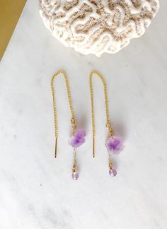 This Natural Raw Amethyst rough stones (10-12mm) threaders earrings in gold or sterling silver threaders. The pair also comes with a dangling tiny 4mm amethyst bead accent. Very pretty, unique and delicate statement earrings. 💜Simple, Dainty and Elegant Raw Natural Stone for everyday wear. I usually wear it with a matching necklace. Simple yet elegant especially the shine and color are so gorgeous.The picture does not do it justice it and is much prettier in person. Perfect for birthday, Christ Adjustable 14k Gold Filled Threader Earrings For Gifts, Adjustable 14k Gold Filled Threader Earrings As Gift, Adjustable Yellow Gold Threader Earrings For Gifts, Adjustable Hypoallergenic Dainty Threader Earrings, Wire Wrapped Healing Drop Earrings, Healing Wire Wrapped Drop Earrings, Nickel-free 14k Gold Filled Threader Earrings As Gift, Dainty Drop Earrings With Natural Stones, Purple 14k Gold Filled Jewelry As A Gift