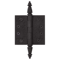 a black iron door hinge with four knobs