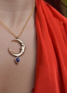 In the Ancient mythology Zirna was an Etruscan goddess of the waxing moon. The moon is the symbol of the soul, the closet celestial body of the planet Earth. This is a sculptural pendant, carved in wax, casted in Bronze, set with a beautiful Lapis Lazuli gemstone & polished to a beautiful burnished gold finish. It is harmonized with a long bronze cable chain. Circumference is 42 cm. Looks great layered on it's own but do not hesitate to pair it with other chain necklaces for a truly unique look Celestial Moon-shaped Jewelry For Meditation, Celestial Moon Jewelry For Meditation, Celestial Necklaces For Meditation, Elegant Jewelry With Moon Charm For Meditation, Celestial Style Necklace With Moon Charm, Celestial Sterling Silver Jewelry For Meditation, Celestial Crescent Jewelry For Meditation, Sterling Silver Celestial Jewelry For Meditation, Brass Moon Charm Jewelry