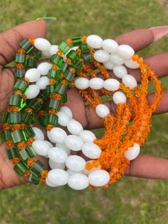 Double Strand Elastic Waist Bead - Orange/Green White Spiritual Beaded Necklace With Tiny Beads, Spiritual White Beaded Necklace With Tiny Beads, Orange Faceted Beaded Bracelets, Orange Faceted Round Beaded Bracelets, Adjustable Orange Spacer Beads, White Bohemian Beaded Necklace With Faceted Beads, Orange Polished Beads Bracelet, Orange Spacer Beads For Gifts, Traditional Orange Beaded Bracelets With Polished Beads