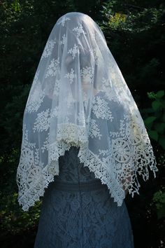 "Evintage Veils~ In an incredibly intricate, beautiful embroidered lace, this soft, ivory veil is of heirloom quality. A medium length mantilla, it provides excellent coverage, and it is soft and comfortable. Measures about 50 X 23 inches. In a long size, here: https://www.etsy.com/listing/1056055539/evintage-veils-mater-dei-heirloom-wrap?ref=shop_home_active_1 Also in an infinity veil here: https://www.etsy.com/listing/960466585/evintage-veilsready-to-ship-mater-dei?ref=shop_home_active_41& Vintage Lace With Lace Trim For Ceremony, Cream Lace Veil With Lace Work, Vintage Embroidered Lace For Wedding, Traditional Crochet Lace For Wedding, Cream Bohemian Lace With Lace Trim, Bohemian Cream Lace With Lace Trim, Vintage Cream Lace For Ceremonies, Vintage Cream Lace For Ceremony, Bohemian Lace Patchwork For Wedding