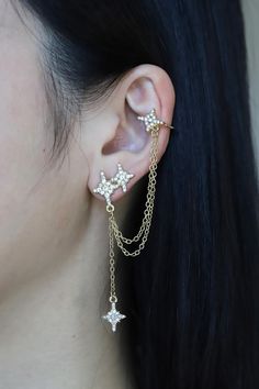 We have the best handmade earrings at affordable price. Perfect for gift giving 🎁 to you and your love ones. Unique stars starburst earrings / ear cuff / ear stud with cuff / ear wraps / ear crawler with dainty gold chain, diamonds, 925 silver ear wires and an asterisk shooting star design. Statement piece for a confident woman. You can't find such unique & cool earrings anywhere else! These are perfect for sweater, jacker and coat.  - 100% HANDMADE DESIGN - We turn the inspiration into unique, Earrings Combinations, Two Ear Piercings, Ear Cuff Chain Earrings, Ear Stacks, Silver Earring Cuff, Earring Cuff Chain, Ear Cuff Chain, Gold Starburst, Starburst Earrings