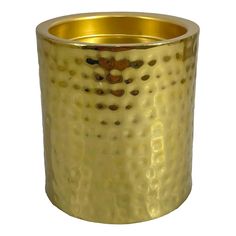 a gold colored vase is shown on a white background and it has holes in the middle