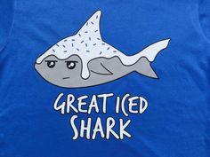 a blue t - shirt with an image of a shark that says, created shark