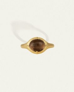 The Esse Ring is an 18k gold vermeil seal ring with oval cabochon dome. Shop signet ring with smoky quartz symbolising connection to the earth. Seal Ring, Carnelian Ring, Diamond Guide, Gold Signet Ring, Vermeil Jewelry, Domed Ring, Engagement Ring Wedding Band, Oval Cabochon, Ring Gold