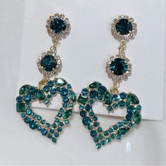 Green Crystal Rhinestone Heart Long Drop Earrings Zircon Crystal Stone Quality: Aaa+ Unique Design Statement Earrings Heart Earrings Bundle & Save Fast Shipping Offers Welcome Posh Ambassador Over 300 Love Notes Please Look At My Other Beautiful Jewelry Green Heart Shaped Earrings For Parties, Green Heart Earrings For Valentine's Day Party, Green Earrings For Valentine's Day Party, Earrings Heart, Earring Bundle, Design Statement, Long Drop Earrings, Rhinestone Heart, Green Crystal