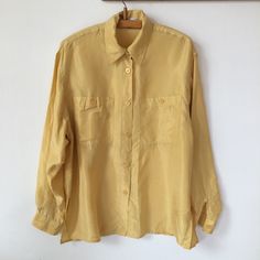 Such a lovely vintage 80's pastel yellow oversized silk shirt with pocket. Size EU 38- M Material:100% silk Measurements: shoulder to shoulder:17,5" pit to pit:21,4" length:27" Good condition. Oversized Silk Shirt, 80s Pastel, Pastel Vintage, Silk Clothes, Shirt With Pocket, Yellow Silk, Pastel Yellow, Vintage Yellow, Pocket Size