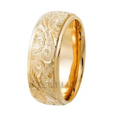 a wedding ring with an intricate design in yellow gold