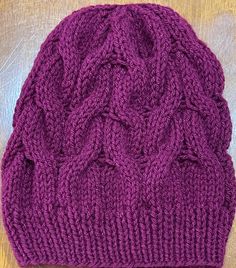 This lightweight beanie is knitted in Cable Knit  Slouchy Beanie style, that will help keep you warm during the chilly seasons. The vibrant Boysenberry Purple color will go with any outfit in your wardrobe.  This beanie is knitted with love and the hope that you or whomever you gift it to will love it for years to come.  Easy care, wash on gentle and dry on low heat or allow to air dry. Part of the proceeds from this sale will go towards helping those in need in the Pacific Northwest Communities.  Thank you for your support in advance! Casual Cable Knit Beanie For Winter, Fall Cable Knit Beanie One Size, Casual One Size Cable Knit Beanie, Fall Cable Knit Beanie For Cold Weather, Winter Cable Knit Beanie One Size, Cable Knit Beanie Cap One Size, Cozy Cable Knit Beanie For Cold Weather, Cable Knit Beanie Cap, Cable Knit Beanie For Fall