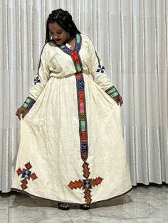 Habesha kimis Ethiopia culture dress fetel very beautiful dress made form 100 %organic cotton can be worn for holidays and special occasions  Can be washed on hand on cold water Cotton Maxi Dress For Traditional Ceremonies, Traditional Multicolor Long Sleeve Maxi Dress, Bohemian Long Sleeve Gown For Traditional Ceremonies, Cream Floor-length Dress For Festivals, Traditional Long Sleeve Dresses For Ceremonies, Traditional Long Sleeve Maxi Dress For Festivals, Festive White Cotton Maxi Dress, Cotton Dresses For Traditional Ceremonies, Long Dresses For Traditional Ceremonies And Festivals