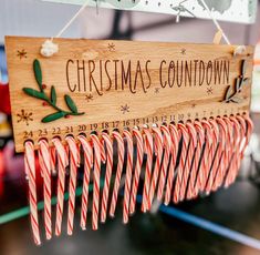 Christmas Countdown Candy Canes Candy Cane Christmas Countdown Sign, Candy Cane Advent Calendar Diy, Candy Cane Advent Calendar, Christmas Count Down, Wooden Candy Canes, Christmas Countdown Ideas, Holiday Woodworking Projects, Wood Advent Calendar, Christmas Market Stall