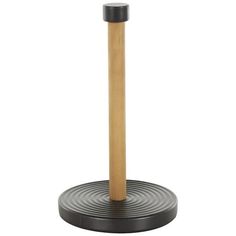 a wooden pole with a black top on a white background and an object in the foreground