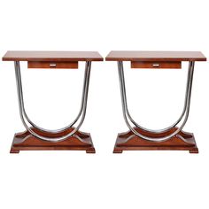 two wooden tables with metal legs on white background