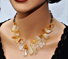 ♥ Made to order (1-3 days) ♥ 100% handmade ♥ Packed in gift box ♥ Material: Genuine Quartz Citrine ♥ Custom length Chunky yellow quartz cluster necklace designed with beautiful citrine free forms beads. Beads plays with the light and creating amazing effects. Statement of luxury & elegance! This warm colors necklace is a real eye-catcher. Exquisite timeless & graceful necklace adds instant sophistication to any outfit, by day or night. Finished with toggle clasp. Add the matching earring Citrine Beaded Necklace, Yellow Crystal Necklaces For Gift, Handmade Citrine Necklaces, Handmade Elegant Citrine Crystal Necklace, Unique Yellow Jewelry With Gemstone Beads, Elegant Handmade Citrine Crystal Necklace, Yellow Crystal Gemstone Bead Necklace For Gifts, Handmade Yellow Citrine Necklaces, Elegant Yellow Handmade Crystal Necklaces