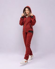 Expertly designed for maximum comfort and style, the Women's Flora hoodie and sweatpants set is perfect for everyday wear. Made with soft fleece material, this set provides warmth and coziness, while the zip up design allows for adjustable coverage. Elevate your loungewear game with this trendy and comfortable set. About this item1.Full Zip up Fleece hoodie with 2 side pockets2.Comfortable and durable fleece material set3.Relaxed and comfortable fitting4.Machine wash. Machine Dry. Product detailsFabric type : 60% Cotton, 40% PolyesterCare instructions: Machine WashOrigin: Imported Hooded Fleece Tracksuit, Fleece Hooded Tracksuit Sportswear, Hooded Fleece Tracksuit Sportswear, Winter Tracksuit With Kangaroo Pocket, Winter Hoodie Tracksuit With Pockets, Fall Sportswear Tracksuit With Kangaroo Pocket, Winter Tracksuit With Drawstring Hood For Jogging, Comfortable Sweats With Double-lined Hood For Loungewear, Cozy Hooded Winter Tracksuit