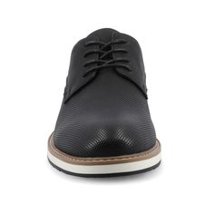 Meet the Leon dress shoe from Vance Co., a refined and comfortable choice featuring a 1-inch block heel, lace-up closure, and round toe design. Crafted with faux leather, fabric lining, and a 12 mm Tru Comfort Foam™ footbed, it provides both style and cushioned support for various occasions. The rubber outer sole ensures reliable traction, making the Leon a sophisticated and practical addition to your footwear collection. Black Lace-up Shoes For Business In Spring, Black Lace-up Dress Shoes For Business Casual, Black Lace-up Business Shoes For Spring, Black Lace-up Shoes For Business Spring Season, Spring Workwear Lace-up Shoes With Textured Sole, Elegant Synthetic Lace-up Oxfords, Black Lace-up Dress Shoes For Derby, Casual Lace-up Shoes With Flat Heel For Derby, Synthetic Lace-up Shoes With Brogue Detailing