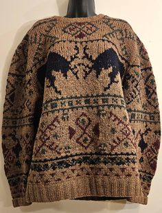 Gorgeous, chunky handknit, vintage Ralph Lauren iconic winter sweater featuring two stags in battle about to interlock antlers. Neutral cocoa brown wool, timeless colourway. Warm and cozy, will never go out of style. Tag is coming off from neckline on left side, just needs a stitch or 2 to reattach. Wear commensurate with age but overall really lovely condition. Some small pulls but really nothing to detract. Marked size MEDIUM - measurements are: Bust (pit to pit, flat) - 23"  Waist - 22" across flat Bottom hem - 19" across flat There is stretch. Great wearable size. This item has not been laundered due to personal preferences - I leave this up to purchasers. Cozy Brown Sweater For Outdoor, Cozy Brown Outdoor Sweater, Cozy Brown Sweater, Vintage Sweater For Outdoor Fall Wear, Polo Ralph Lauren Sweater, Vintage Ralph Lauren, Vintage Polo Ralph Lauren, Cocoa Brown, Winter Sweater