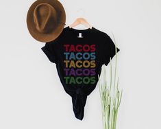 **Don't see a size or COLOR that you want? Just ask Tacos Shirt Funny Cinco De Mayo Shirt for Women Taco Tuesday Shirt Mas Tacos and Tequila Texmex Food Fiesta Chips and Salsa Guacamole Queso >> A premium soft cotton blend UNISEX tee: This t-shirt feels comfy and light, with just the right amount of stretch and the unisex cut is flattering for both men and women. ** SOLID COLORS: 100% spring-run cotton ** Heather colors: 52% spring-run cotton & 48% polyester (Athletic Heather 90% sprin Cheap T-shirt With Funny Print For Cinco De Mayo, Taco Bout A Party, Salsa Guacamole, Texmex Food, Tacos And Tequila, School Sweatshirts, Taco Shirt, Chips And Salsa