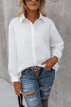 Getting dressed for the work week just got a little bit easier (and stylish) thanks to the "Good Karma" button down long sleeve blouse. Lightweight silky woven fabric shapes this classic top that features a collared neckline and long sleeves with drop shoulders and buttoned cuffs. A full button placket continues down the front of the relaxed bodice that ends a notched hem. Model is in a size small 85% Cotton and 15% Polyester Casual Layering Piece Lightweight Button Down Patterns May Vary Colors Versatile White Button-up Blouse, Relaxed Fit Long Sleeve Blouse For Business Casual, Versatile Long Sleeve Office Shirt, Solid Long Sleeve Blouse For Everyday, Long Sleeve Blouse With Relaxed Fit For Business Casual, Long Sleeve Blouse For Everyday, Long Sleeve Blouse For Everyday Wear, Versatile Long Sleeve Everyday Blouse, Versatile Long Sleeve Blouse For Everyday