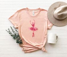 "Ballerina Silhouette Shirt, Ballet T-Shirt, Ballet Dancer Gift, Ballet Shirt, Dancer T-Shirt, Ballerina Tee, Cute Ballerina Shirt, Dance Tee ☀️☀️☀️☀️☀️ Everything in our shop is hand crafted and made to order. If you want different color or size contact me! If you would like something custom made to fit your personal style please message me and I will do everything to get you that something special. ---How To Order--- ⭐️Please, check and review all photos ⭐️Choose your t-shirt size and color ⭐️ Relaxed Fit T-shirt For Dance With Short Sleeves, Casual Summer T-shirt For Dance, Summer Crew Neck Tops For Dance Class, Crew Neck Tops For Dance Class Summer, Stretch Cotton T-shirt For Dance Class, Fitted Pink Graphic Tee Shirt, Cotton Summer Dance Tops, Fitted T-shirt For Summer Dance, Fitted Screen Print Shirt For Spring