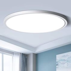 a white ceiling light in a living room