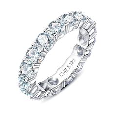 a white gold ring with rows of round cut diamonds in the center and an inscription on the side