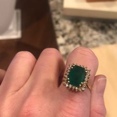 Gorgeous Emerald Ring In 14k Gold Surrounded By 24 Small Diamonds Emerald Ring With Diamonds, Vintage Emerald Engagement Ring, Emerald Engagement, Emerald Engagement Ring, Emerald Ring, Womens Jewelry Rings, Colored Diamonds, Engagement Ring, Emerald