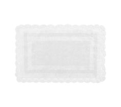 a white place mat with scalloped edges